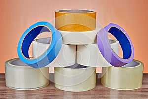 Set of masking tape is stacked in form of pyramid.