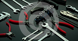 Set of mechanic tools. Chrome wrenches or spanners, hexagon socket, end cutter pliers, locking pliers, vernier caliper, pincers, photo