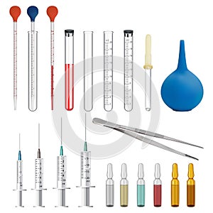 A set of medical and laboratory equipment. Measured laboratory test tubes and glass pipettes with a scale and a rubber