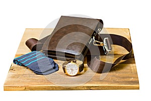 Set of men`s stylish fashion clothing and accessories. Stylish men`s watch, socks and bag.