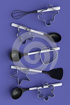 Set of metal cookie cutters and wooden kitchen utensils on violet background