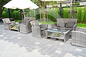 Set modern furniture rattan armchairs and table in garden ,outdoor