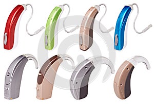 Set of modern hearing aids on white background isolated, alternative to surgery