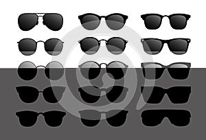 Set of modern sun glasses. Glasses with black glass