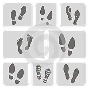 Set of monochrome with footprints and shoeprint icons photo