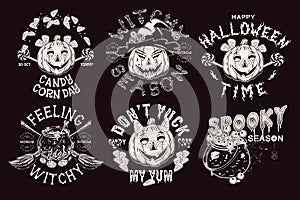 Set of monochrome vintage labels with Halloween symbols