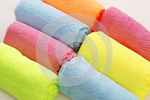 A set of multi-colored microfiber cloths for cleaning