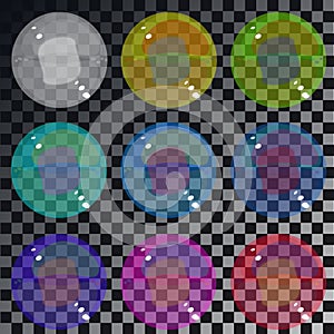 Set of multicolored transparent glass spheres on a plaid background