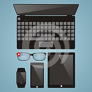 Set of multimedia devices. Laptop, smart glasses, smart watches, tablet, smartphone. vector illustration, top view.