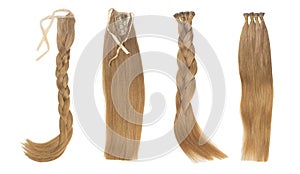 Set of multiple fake women hair extensions in tails, isolated on white background.