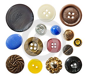 Set of a multiple old sew-through cloth buttons isolated