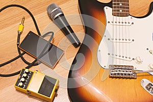 Set of music objects with sunburst electric guitar