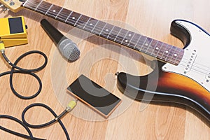 Set of music objects with sunburst electric guitar