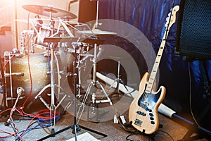 Set of musical instruments. Bass guitar and drums