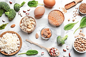 Set of natural food high in protein on marble background