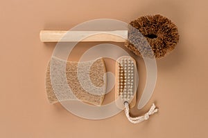 Set of natural household cleaning products - bamboo brushes and organic dishcloth