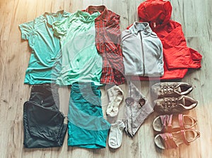 Set necessary clothes for female hiking: shorts,pants,trekking socks, thermal top, t-shirts,fleece jacket, boots, sandals photo