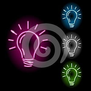 Set of neon light bulb icons in four different colours isolated on black background. Idea, solution, creativity concept