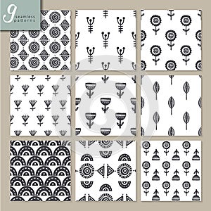 Set of nine hand drawn seamless abstract patterns in black and white colors.