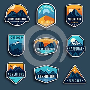 Set of nine mountain travel emblems. Camping outdoor adventure emblems, badges and logo patches. Mountain tourism photo