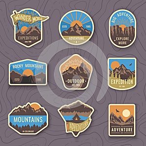 Set of nine mountain travel emblems. Camping outdoor adventure emblems, badges and logo patches. Mountain tourism