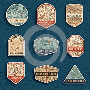 Set of nine topographic map travel emblems. Outdoor adventure emblems, badges and logo patches. Forest camp labels in