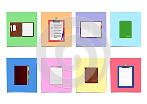 Set of notebooks and clipboards on colored sheet of paper photo