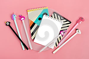 Set of notebooks for notes and pens on pink background Place for text Flat lay Top view Goals,Means, Resolution concept