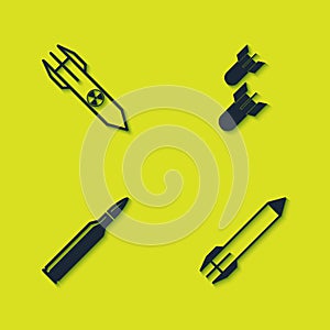 Set Nuclear rocket, Rocket, Bullet and Aviation bomb icon. Vector