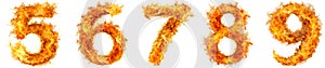 Set of numbers from 5-9 from fire on a white background