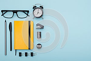 Set of office items lie on the table. Minimalistic set for work and study