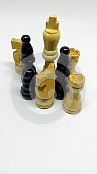 Set of old wooden black and white chess board game pieces