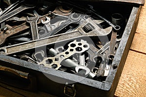 Set of old wrenches in a wooden box, hand tools for DIY and repairing
