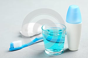 Set of oral care products on light background