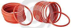 Set of orange hydraulic and pneumatic o-ring seals isolated on a white background.