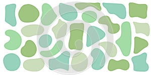 Set of organic irregular blob shapes. Green random deform spot fluid circle Isolated on white background. Organic amoeba