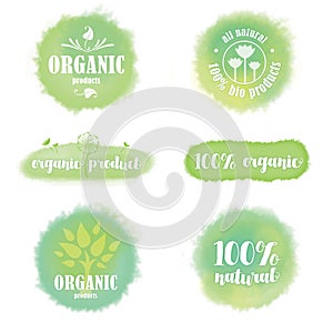Set of organic logos and badges on watercolour background
