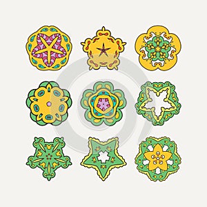 Set of ornate vector mandala symbols. Mehndi lace tattoo. Oriental weave with sharp corners.