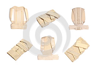 Set with orthopedic corsets on white background