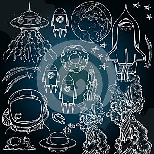 Set outline drawing with the spacecraft on a dark background. Different types of shuttles and flying saucers