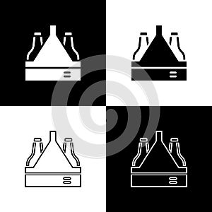 Set Pack of beer bottles icon isolated on black and white background. Case crate beer box sign. Vector