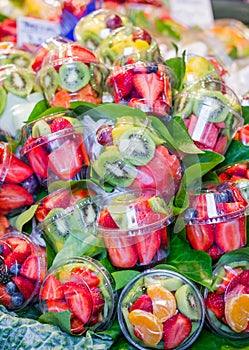 Set packed of fresh fruits in La Boqueria market, in Ramblas street, Barcelona, Spain