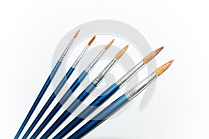 A set of paint brushes.