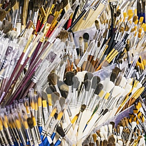 Set of paint brushes of various tips for drawing, selective focus, hobby concept