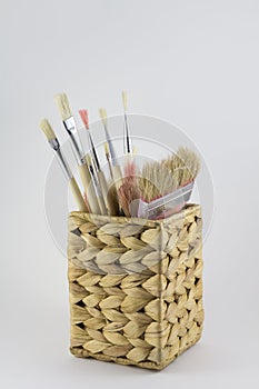 Set of paintbrushes in a pot