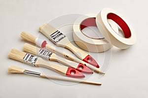 Set of painting brushes and masking tapes