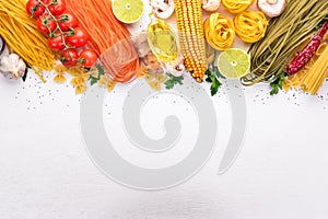 Set of pasta, noodles, spaghetti. Italian cooking, fresh vegetables and spices. On a white background.
