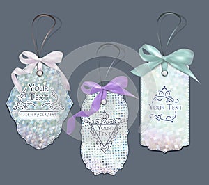 Set of pastel elegant tags with floral design elements and silk bows