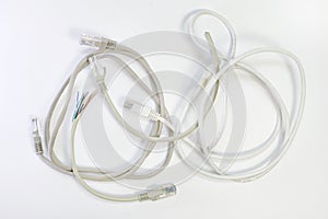 set of patch cords with different color top wire insulation, wound into a ring and the trimmed ends of the wires