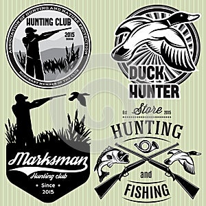 Set of patterns with duck, dip, gun, hunter for hunting emblem photo